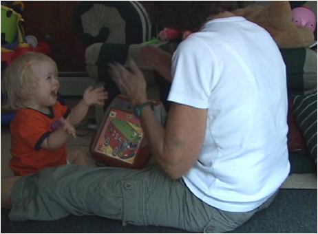 Genevieve and Janice love to talk, play and sign together.